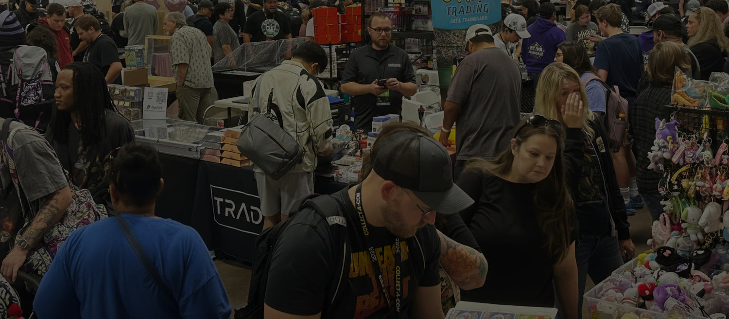People shopping at a convention with booths and displays.
